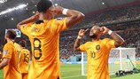 Memphis Depay celebrates his round of 16 goal with Netherlands  team-mate Cody Gakpo 