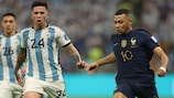Argentina's Enzo Fernández competes with France's Kylian Mbappé during the FIFA World Cup final