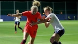 Katie Robinson (England, left) against Norway
