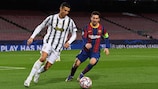 Cristiano Ronaldo e Lionel Messi no último jogo oficial entre ambos, um duelo Barcelona - Juventus na fase de grupos da UEFA Champions League 2020/21