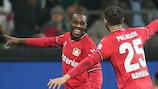 Jeremie Frimpong (R) celebrates a goal for Leverkusen