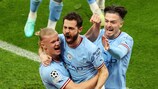 MANCHESTER, ENGLAND - MAY 17: Bernardo Silva of Manchester City celebrates with teammates Erling Haaland and Jack Grealish after scoring the teams second goal during the UEFA Champions League semi-final second leg match between Manchester City FC and Real Madrid at Etihad Stadium on May 17, 2023 in Manchester, England. (Photo by Matt McNulty - Manchester City/Manchester City FC via Getty Images)