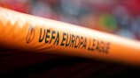 UEFA Europa League branding on a team dug-out