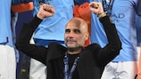 Pep Guardiola celebrates his third UEFA Champions League triumph as a coach