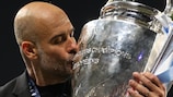  Pep Guardiola kisses the Champions League trophy after Man City's triumph in Istanbul