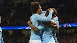 Raheem Sterling (right) celebrates opening the scoring for City