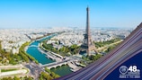 A panoramic view of Paris with the Eiffel tower.