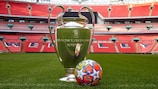 The adidas UCL Pro Ball London alongside the trophy at Wembley Stadium