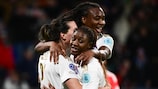 Lyon's Kadidiatou Diani (centre) celebrates after scoring her team's third goal in the win against Benfica