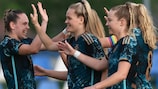 Germany celebrate scoring in their qualification-clinching defeat of Sweden