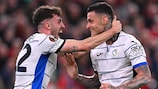 Atalanta's Gianluca Scamacca (right) celebrates with Matteo Ruggeri (left) after scoring in the shock win over Liverpool