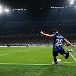 MILAN, ITALY - OCTOBER 03: Hakan Calhanoglu of Inter Milan takes their sides corner during the UEFA Champions League match between FC Internazionale and SL Benfica at Stadio Giuseppe Meazza on October 03, 2023 in Milan, Italy. (Photo by Chris Ricco - UEFA/UEFA via Getty Images)