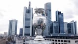 The Henri Delaunay trophy  in front of the Frankfurt skyline