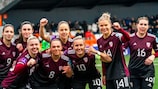 Latvia's women's team celebrate a victory