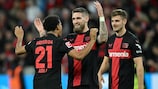 Leverkusen celebrate maintaining their unbeaten Bundesliga record