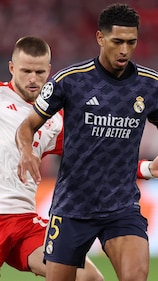 MUNICH, GERMANY - APRIL 30: Jude Bellingham of Real Madrid on the ball whilst under pressure from Eric Dier of Bayern Munich during the UEFA Champions League semi-final first leg match between FC Bayern München and Real Madrid at Allianz Arena on April 30, 2024 in Munich, Germany. (Photo by Alex Pantling/Getty Images)