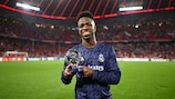 Real Madrid's Vinícius Júnior with his Player of the Match award on Matchday 11