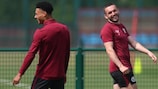 Ollie Watkins and John McGinn share a joke in Villa training on Wednesday